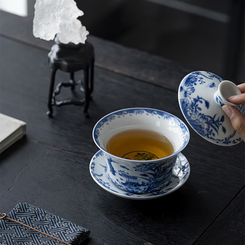 Nimara Ritual Blue And White Porcelain Lotus Koi Fish Lion Dance Watermelon Ceramic Gaiwan Sancai Teacup Kung Fu Tea Cup And Saucer With Lid 300ml