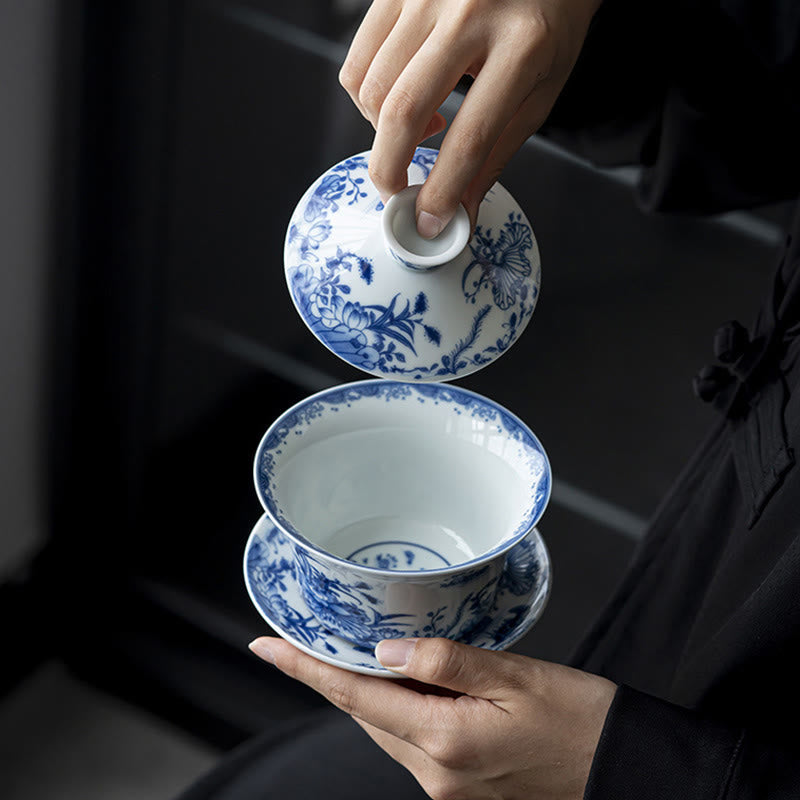 Nimara Ritual Blue And White Porcelain Lotus Koi Fish Lion Dance Watermelon Ceramic Gaiwan Sancai Teacup Kung Fu Tea Cup And Saucer With Lid 300ml