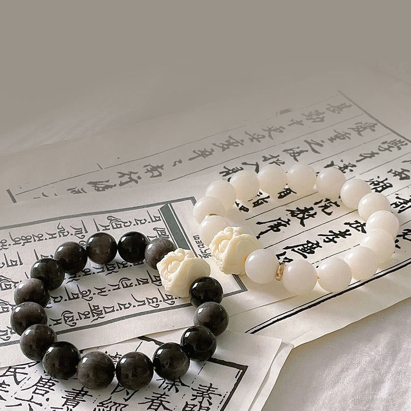 Nimara Ritual Silver Sheen Obsidian Bodhi Seed Ivory Fruit Dancing Lion Protection Bracelet