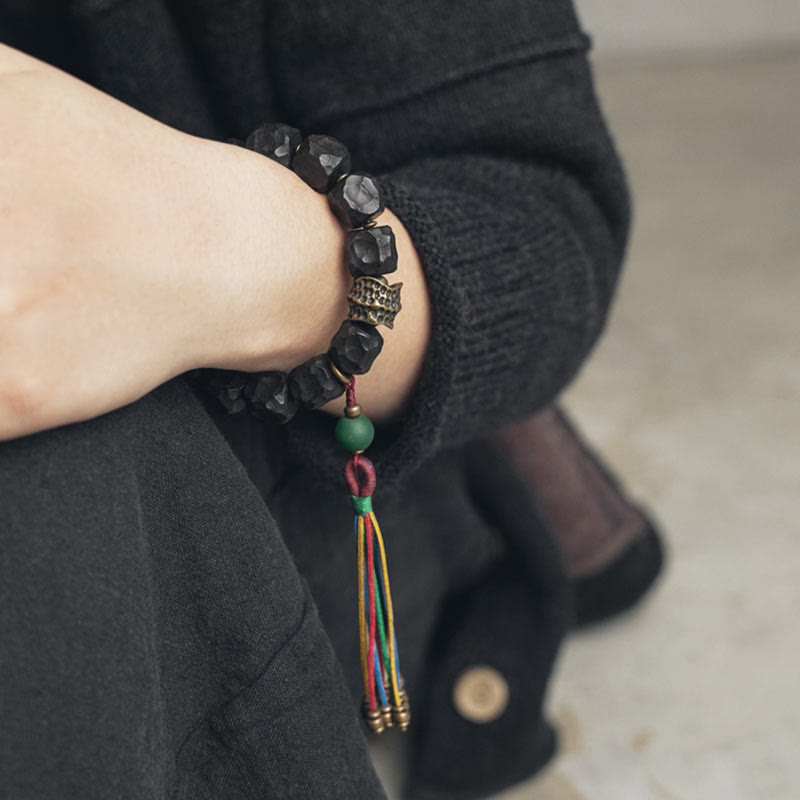 Nimara Ritual Tibet Ebony Wood Copper Peace Tassel Wrist Mala Bracelet