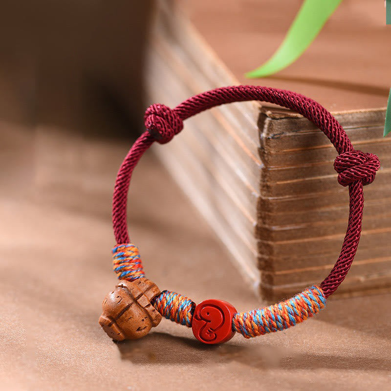 Nimara Ritual Handmade Chinese Zodiac Red String Peach Pit Cinnabar Luck Bracelet