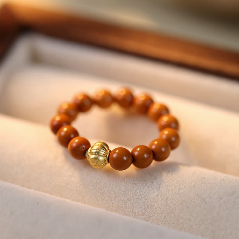 Nimara Ritual Olive Pit Bead Copper Coin Inner Strength Ring