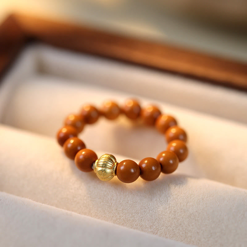Nimara Ritual Olive Pit Bead Copper Coin Inner Strength Ring