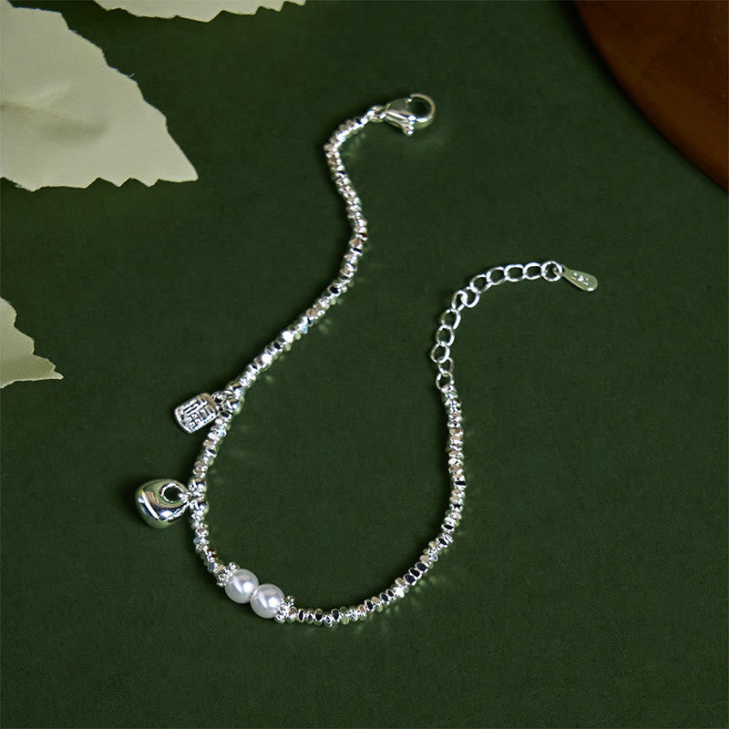 Nimara Ritual Copper Plated Silver Fu Character Purse Pearl Blessing Bracelet
