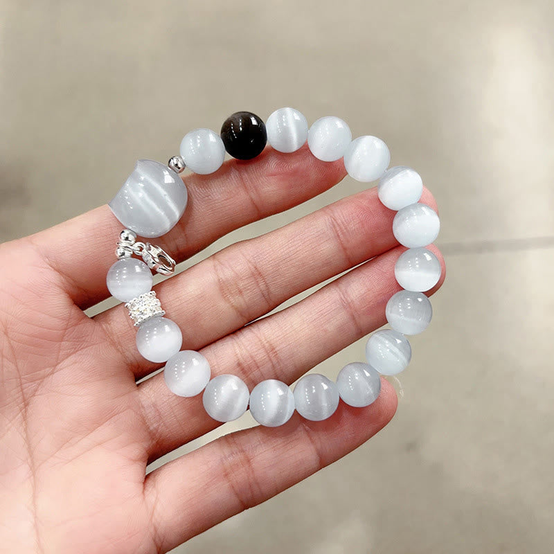 Nimara Ritual Cat Head White Cat's Eye Silver Sheen Obsidian Positive Bracelet