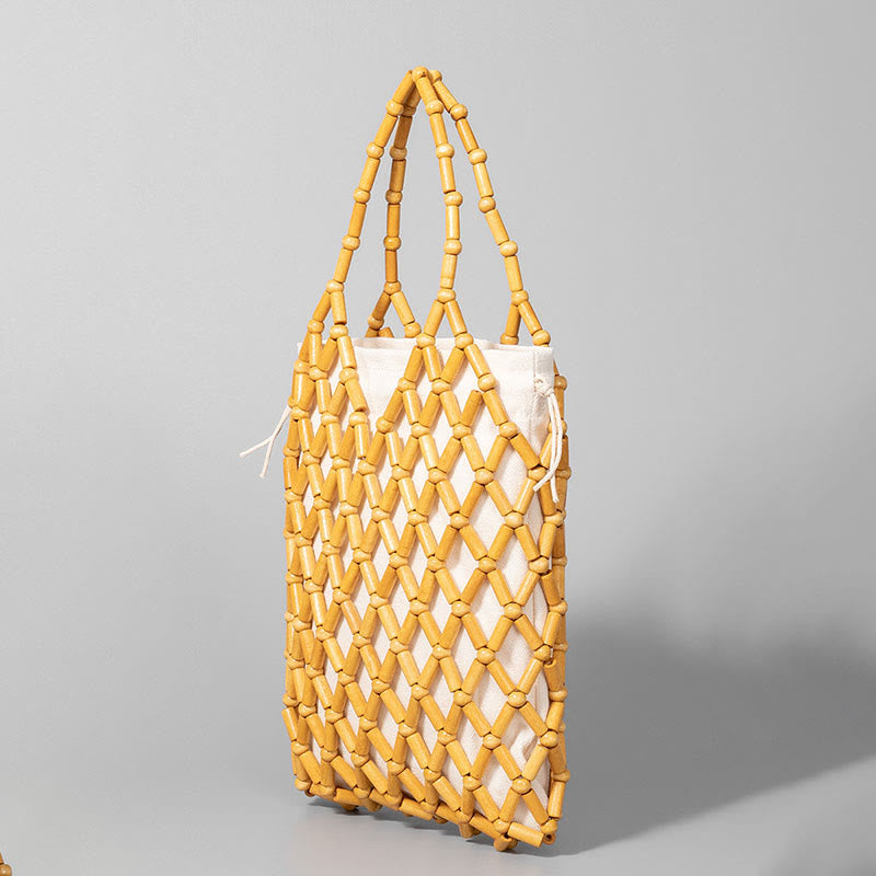 Nimara Ritual Hand-woven Mesh Hollow Wooden Beads Handbag