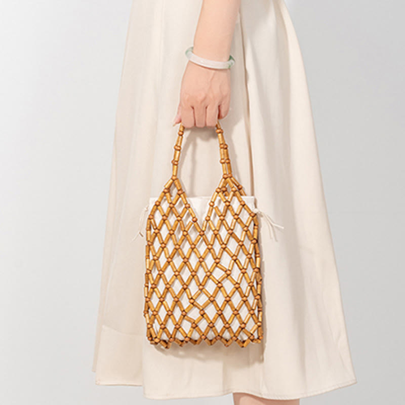 Nimara Ritual Hand-woven Mesh Hollow Wooden Beads Handbag
