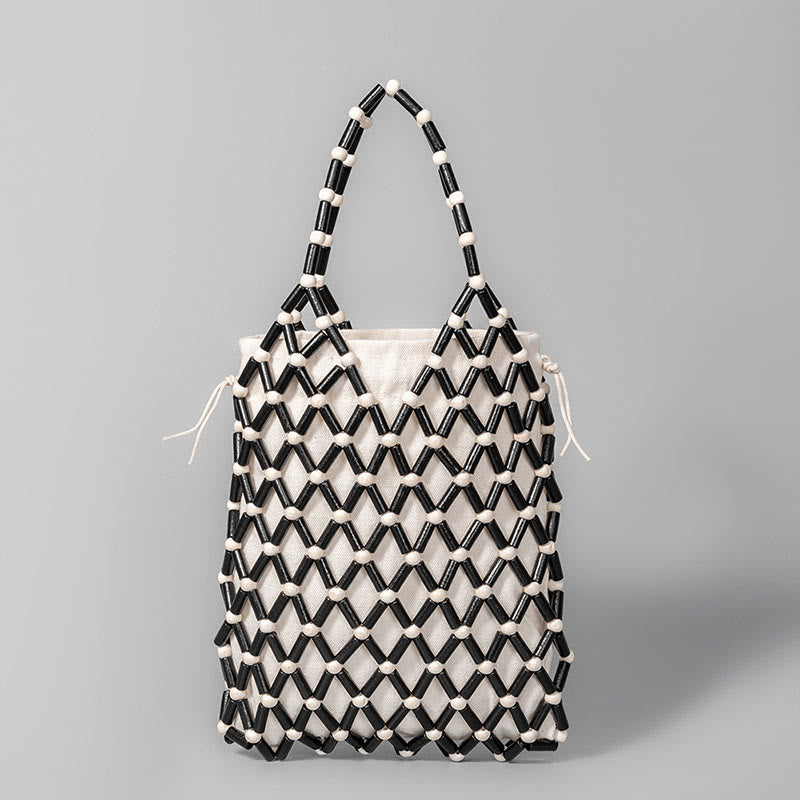 Nimara Ritual Hand-woven Mesh Hollow Wooden Beads Handbag