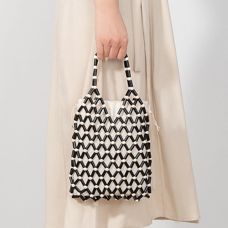 Nimara Ritual Hand-woven Mesh Hollow Wooden Beads Handbag