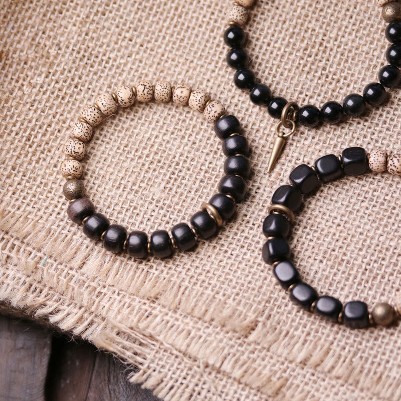 Nimara Ritual Tibetan Bodhi Seed Black Obsidian Ebony Wood Copper Peace Bracelet
