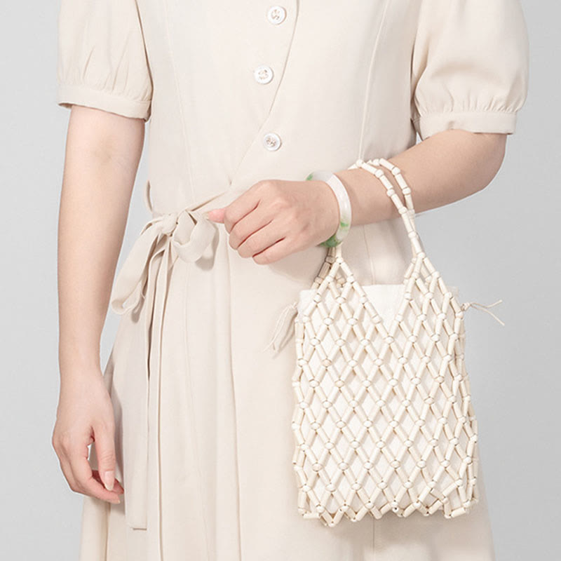 Nimara Ritual Hand-woven Mesh Hollow Wooden Beads Handbag