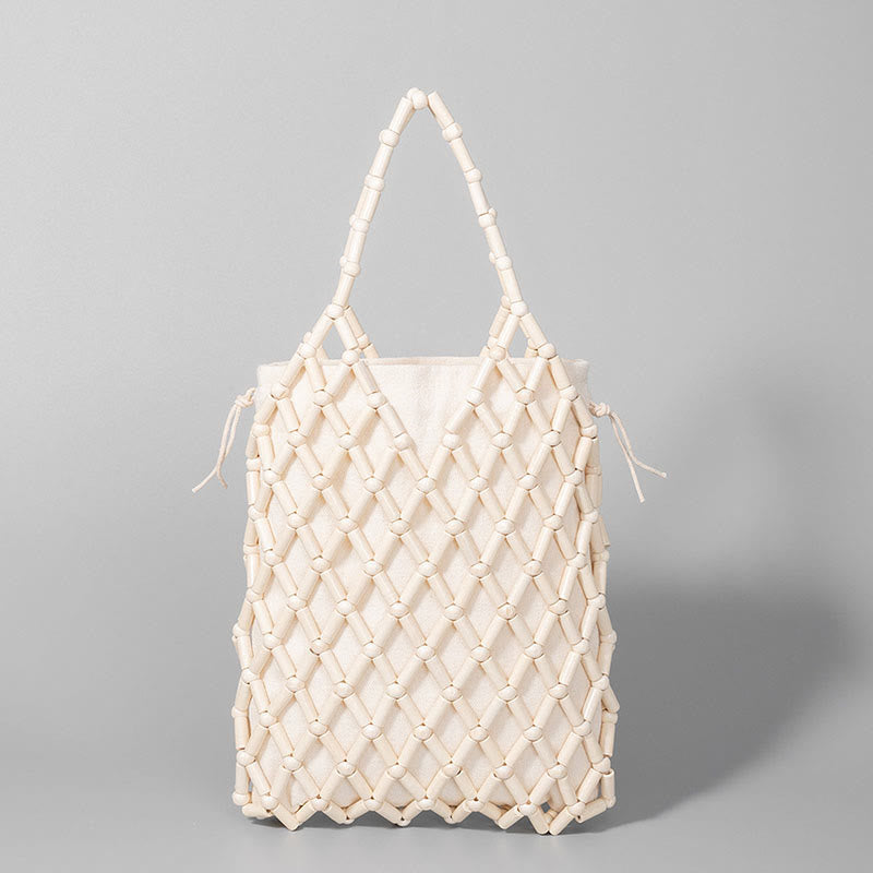 Nimara Ritual Hand-woven Mesh Hollow Wooden Beads Handbag