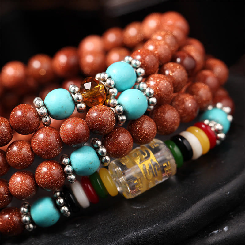 Nimara Ritual 108 Mala Beads Goldstone Om Mani Padme Hum Swastika Confidence Bracelet