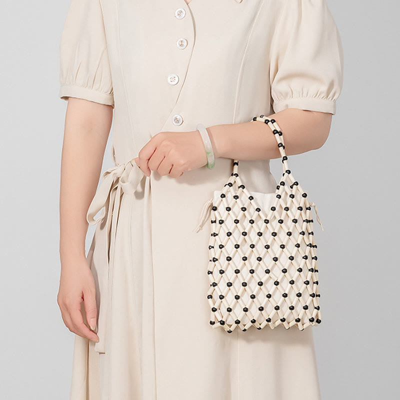 Nimara Ritual Hand-woven Mesh Hollow Wooden Beads Handbag