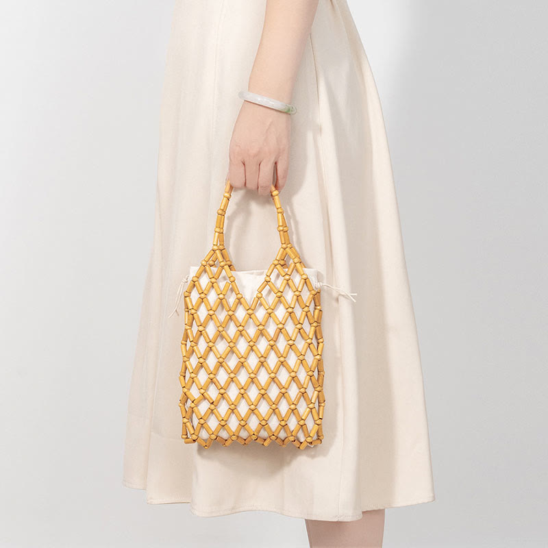 Nimara Ritual Hand-woven Mesh Hollow Wooden Beads Handbag