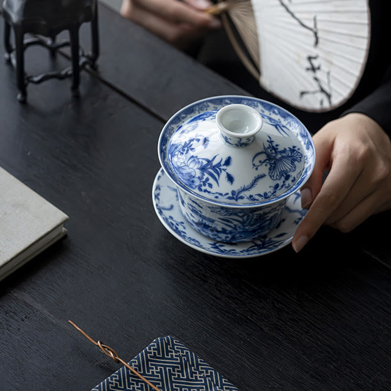 Nimara Ritual Blue And White Porcelain Lotus Koi Fish Lion Dance Watermelon Ceramic Gaiwan Sancai Teacup Kung Fu Tea Cup And Saucer With Lid 300ml