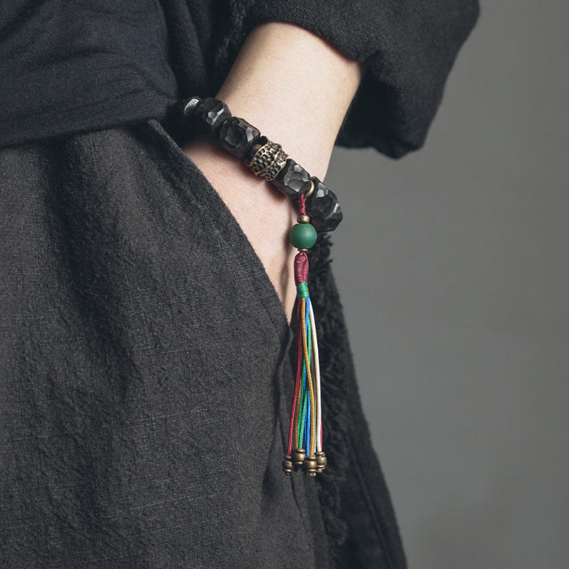 Nimara Ritual Tibet Ebony Wood Copper Peace Tassel Wrist Mala Bracelet