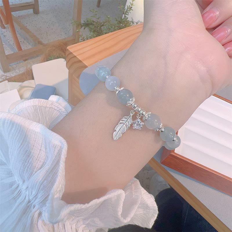 Nimara Ritual 925 Sterling Silver Aquamarine Cat's Eye Healing Feather Star Charm Bracelet
