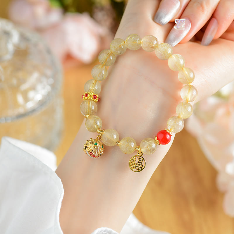 Nimara Ritual Natural Golden Rutilated Quartz Fu Character Charm Bell Wealth Bracelet