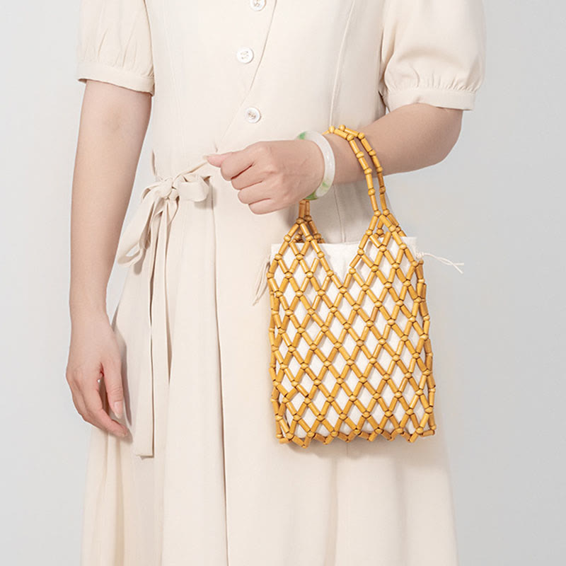 Nimara Ritual Hand-woven Mesh Hollow Wooden Beads Handbag