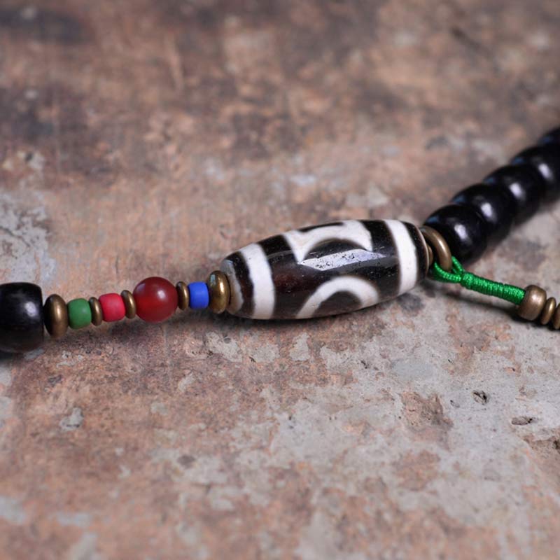 Nimara Ritual 108 Beads Mala Ebony Wood Dzi Bead Copper Balance Tassel Bracelet