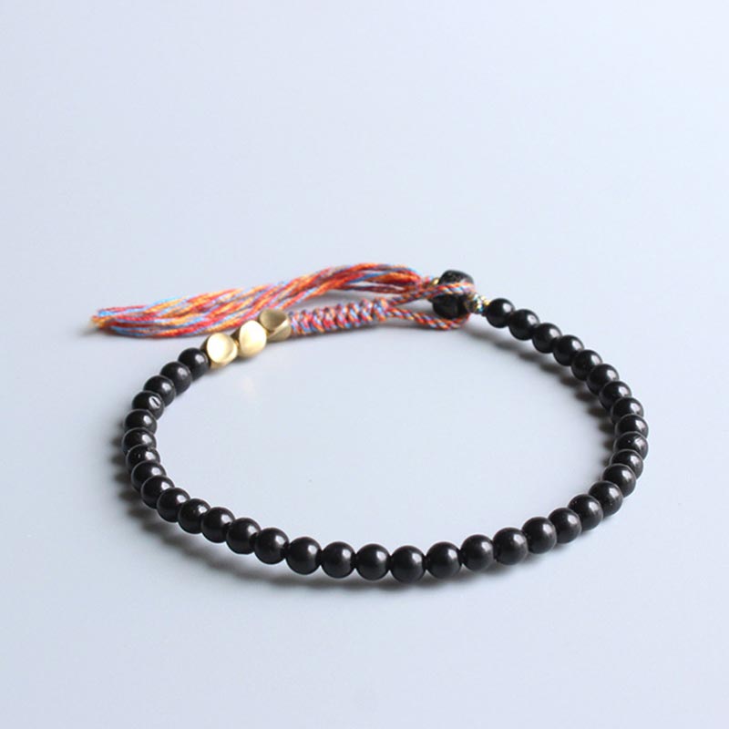 Nimara Ritual Handmade Tibetan Black Onyx Tassel Bracelet