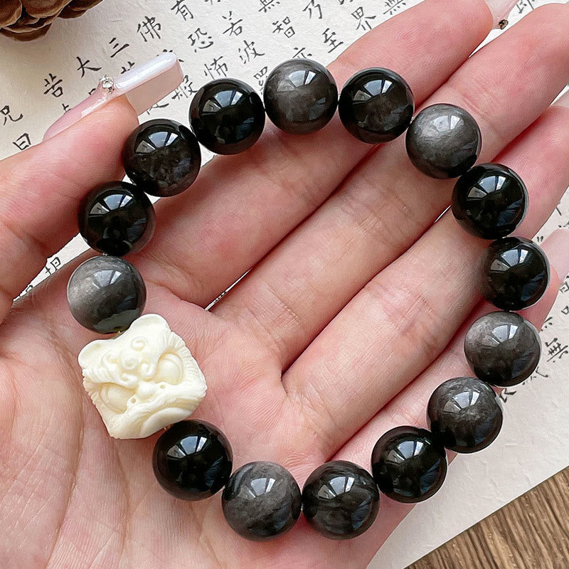 Nimara Ritual Silver Sheen Obsidian Bodhi Seed Ivory Fruit Dancing Lion Protection Bracelet