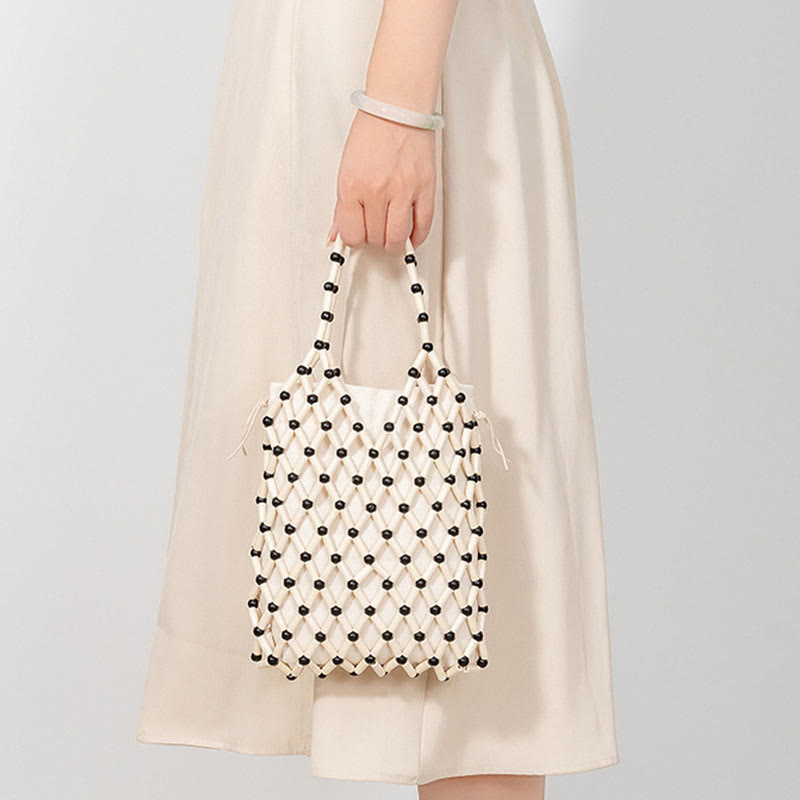 Nimara Ritual Hand-woven Mesh Hollow Wooden Beads Handbag