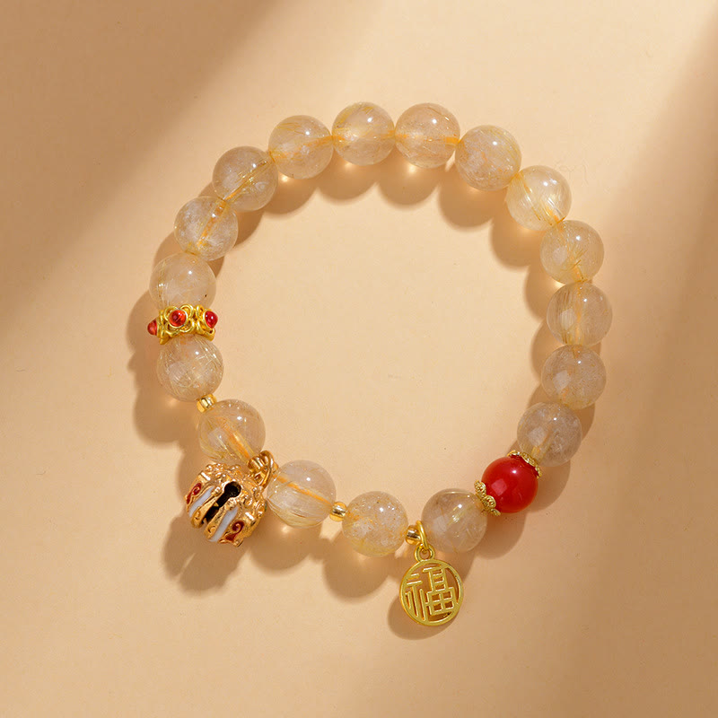 Nimara Ritual Natural Golden Rutilated Quartz Fu Character Charm Bell Wealth Bracelet
