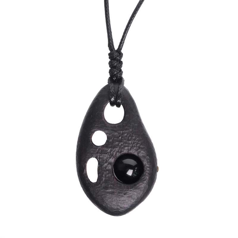 Nimara Ritual Ebony Wood Hollow Inlaid Obsidian Peace Calm Necklace Pendant