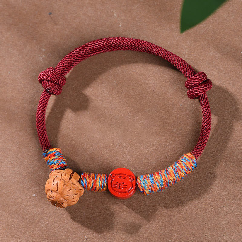Nimara Ritual Handmade Chinese Zodiac Red String Peach Pit Cinnabar Luck Bracelet