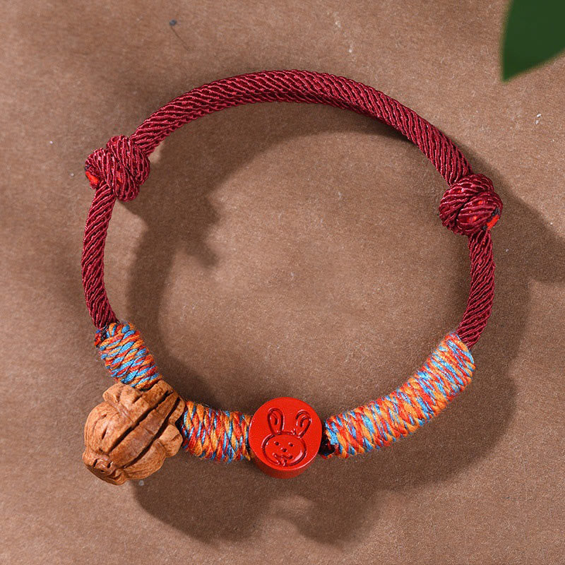 Nimara Ritual Handmade Chinese Zodiac Red String Peach Pit Cinnabar Luck Bracelet