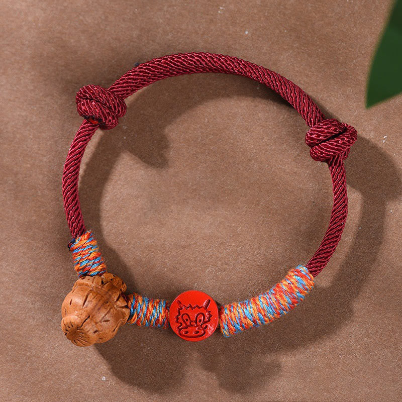 Nimara Ritual Handmade Chinese Zodiac Red String Peach Pit Cinnabar Luck Bracelet