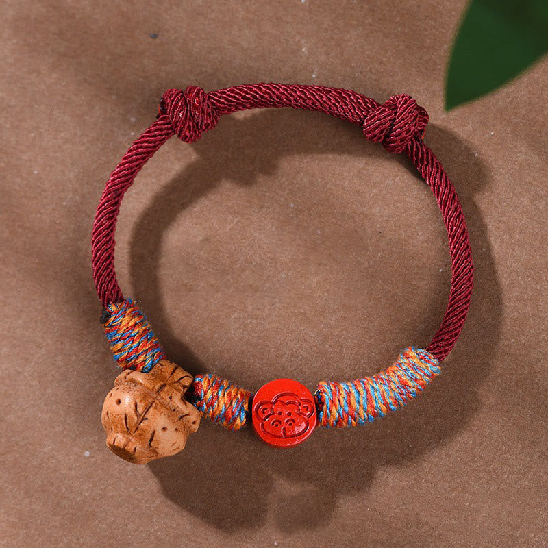 Nimara Ritual Handmade Chinese Zodiac Red String Peach Pit Cinnabar Luck Bracelet