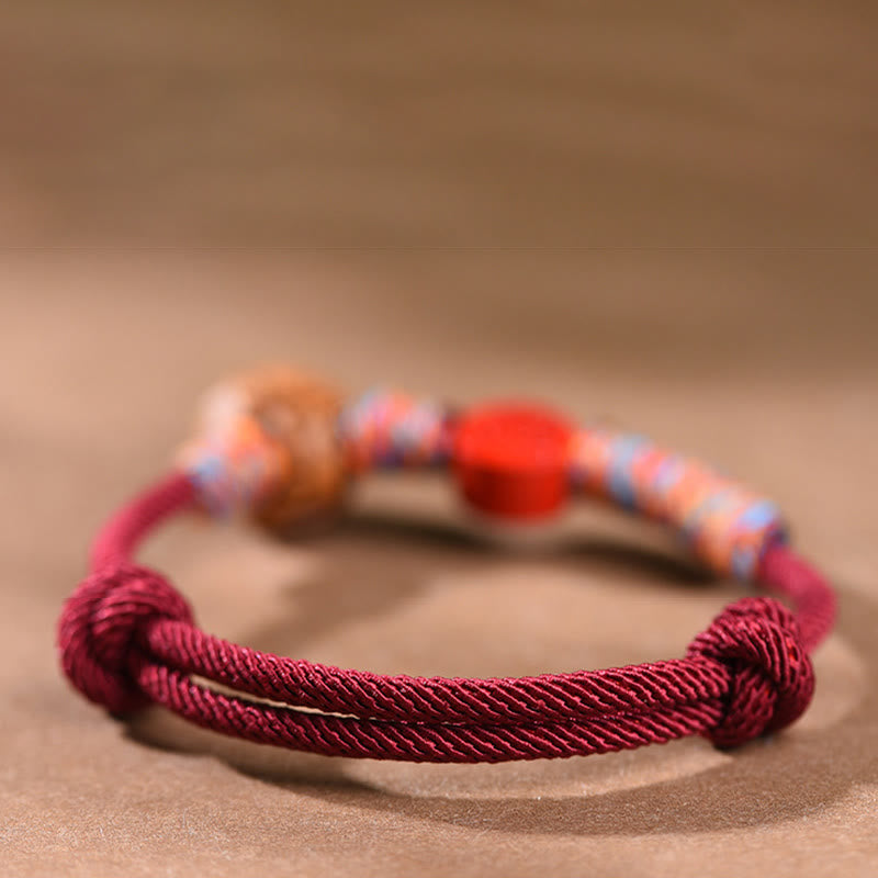 Nimara Ritual Handmade Chinese Zodiac Red String Peach Pit Cinnabar Luck Bracelet