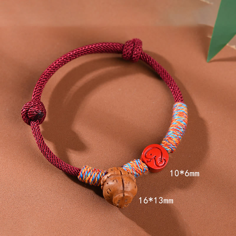 Nimara Ritual Handmade Chinese Zodiac Red String Peach Pit Cinnabar Luck Bracelet