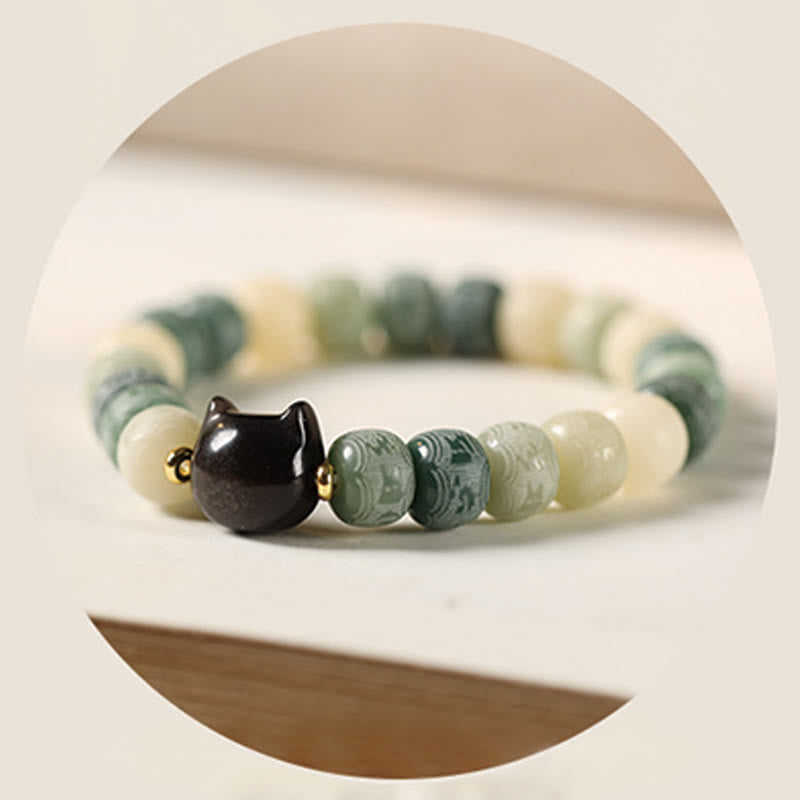 Nimara Ritual Bodhi Seed Om Mani Padme Hum Carved Silver Sheen Obsidian Cat Head Wisdom Bracelet