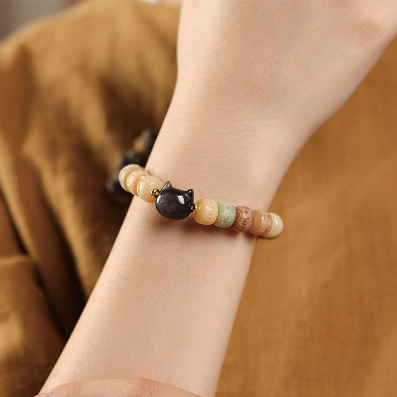 Nimara Ritual Bodhi Seed Om Mani Padme Hum Carved Silver Sheen Obsidian Cat Head Wisdom Bracelet