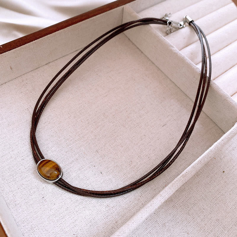Nimara Ritual Natural Tiger Eye Ellipse Protection Wax Rope Necklace Pendant