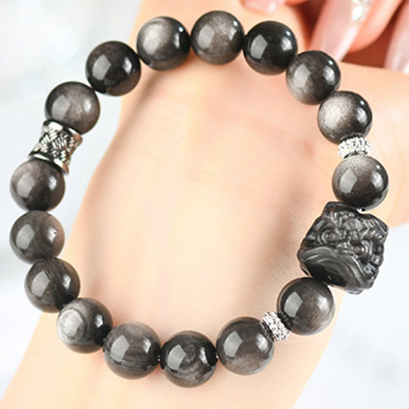 Nimara Ritual Natural Silver Sheen Obsidian Lion Dance Protection Bracelet