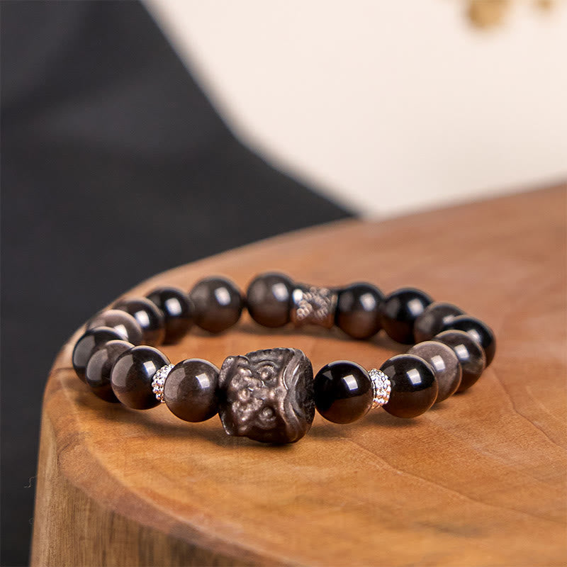 Nimara Ritual Natural Silver Sheen Obsidian Lion Dance Protection Bracelet