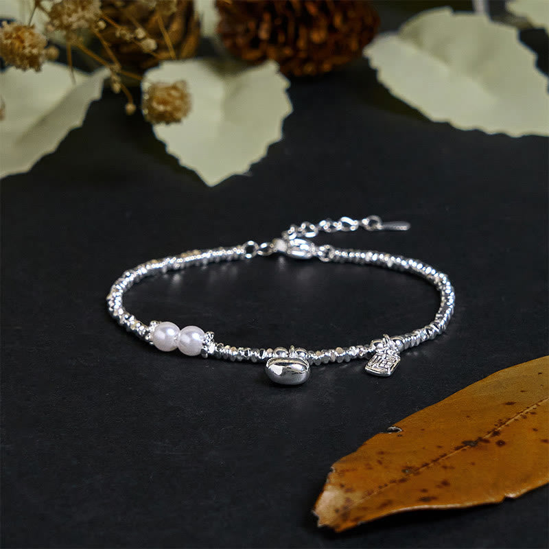 Nimara Ritual Copper Plated Silver Fu Character Purse Pearl Blessing Bracelet