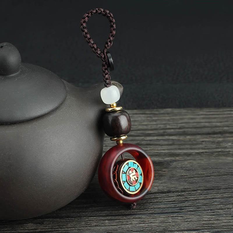 Nimara Ritual Ebony Wood Sanskrit Four-leaf Clover Buddha's Eye Peace Rotatable Key Chain