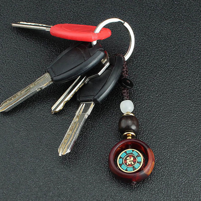 Nimara Ritual Ebony Wood Sanskrit Four-leaf Clover Buddha's Eye Peace Rotatable Key Chain