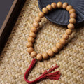 Wisdom and Grounding Phoenix Eye Bodhi Tibetan Engraved Tassel Wrist Mala