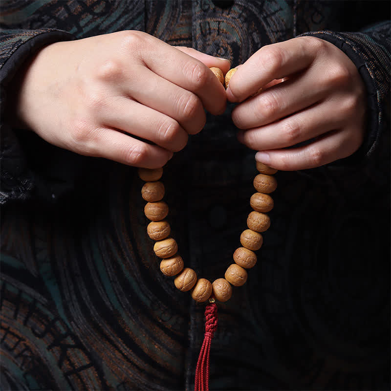 Wisdom and Grounding Phoenix Eye Bodhi Tibetan Engraved Tassel Wrist Mala