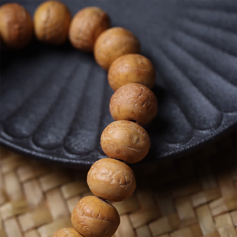 Wisdom and Grounding Phoenix Eye Bodhi Tibetan Engraved Tassel Wrist Mala