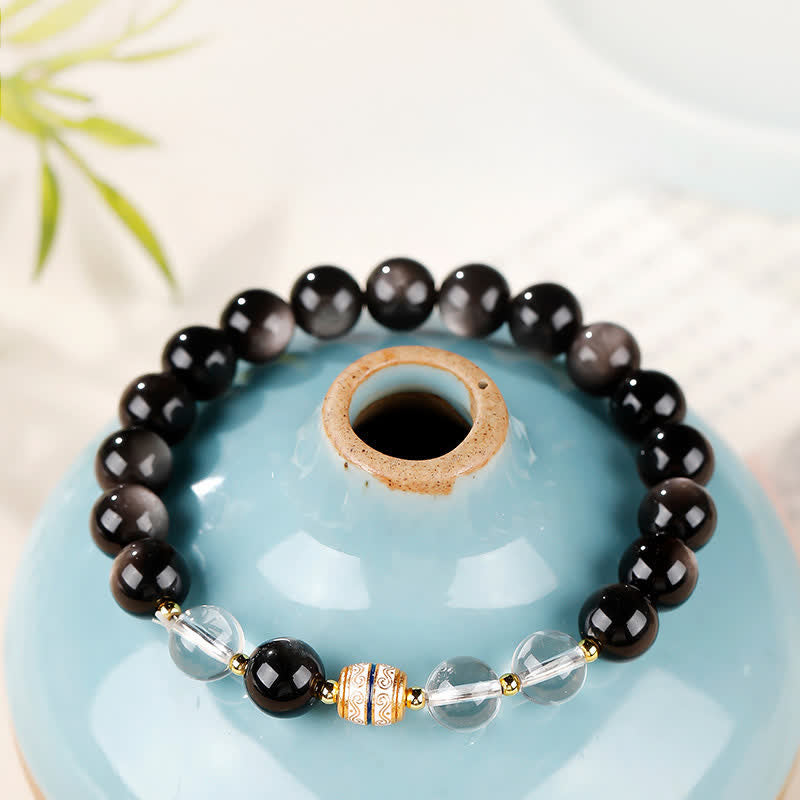 Nimara Ritual Silver Sheen Obsidian Dzi Bead Protection Round Bracelet