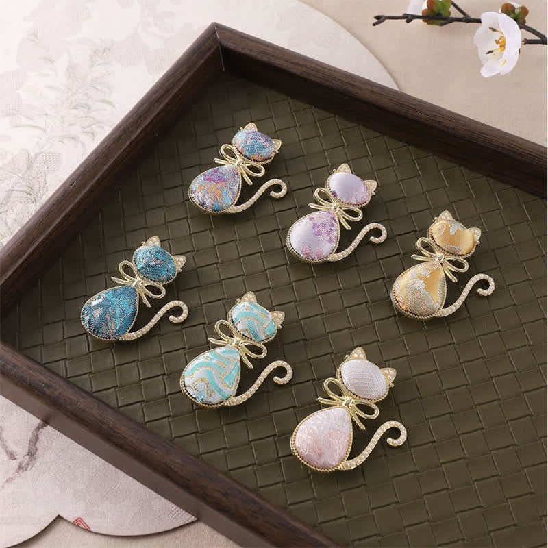 Nimara Ritual Pearl Song Brocade Cat Bow Purity Brooch