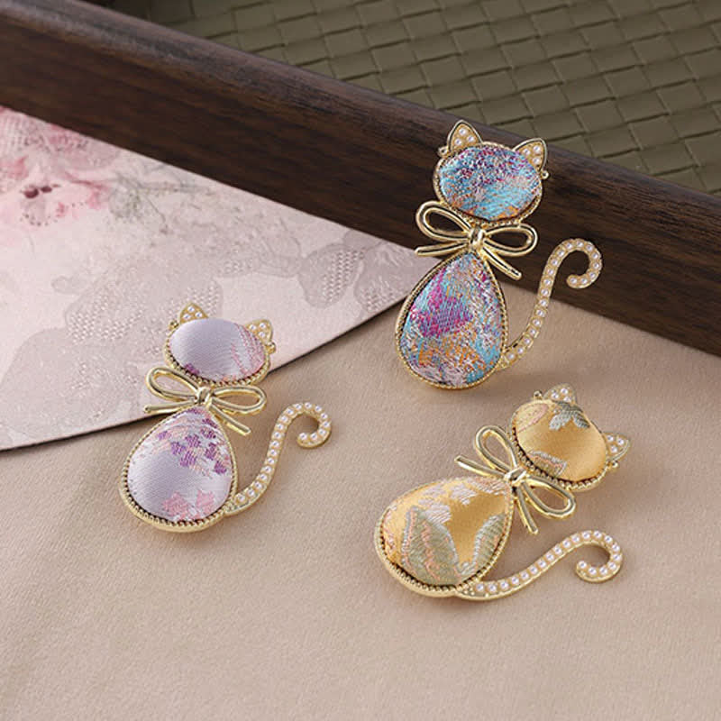 Nimara Ritual Pearl Song Brocade Cat Bow Purity Brooch